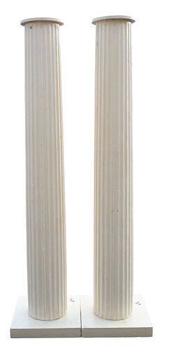 A PAIR OF WOODEN FLUTED PILLARSA