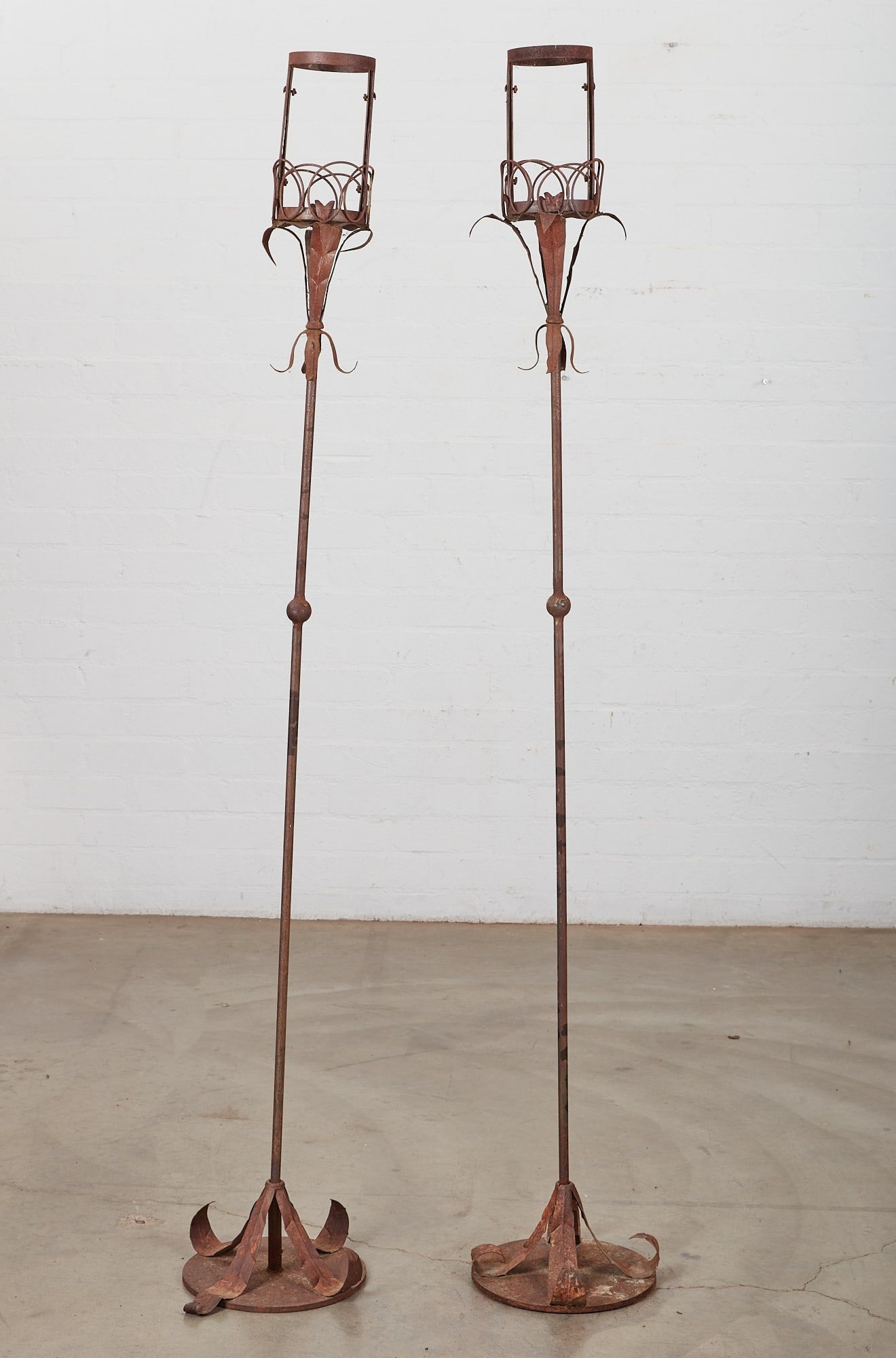 A PAIR OF WROUGHT IRON AND TOLE