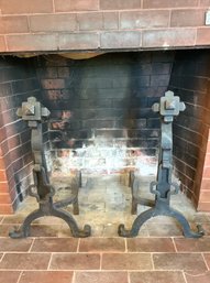 A pair of wrought iron Arts &