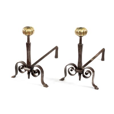 A pair of wrought iron fire dogs