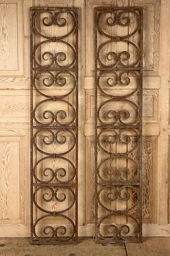A PAIR OF WROUGHT IRON PANELSA pair