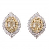 A PAIR OF YELLOW & WHITE DIAMO