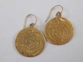 A pair of yellow metal (tests