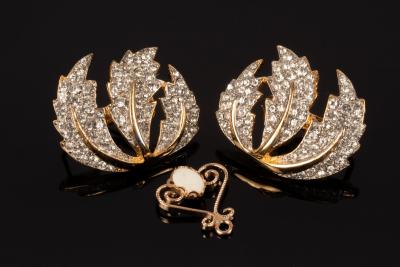A pair of yellow metal Givenchy