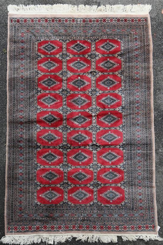 A Pakistani Bokhara design rug with