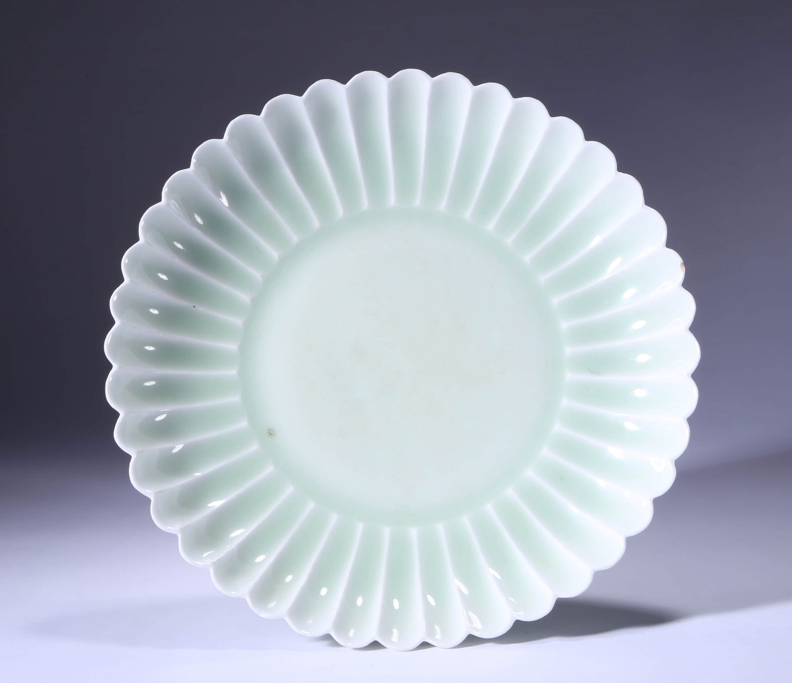 A PALE CELADON GLAZED CHRYSANTHEMUM