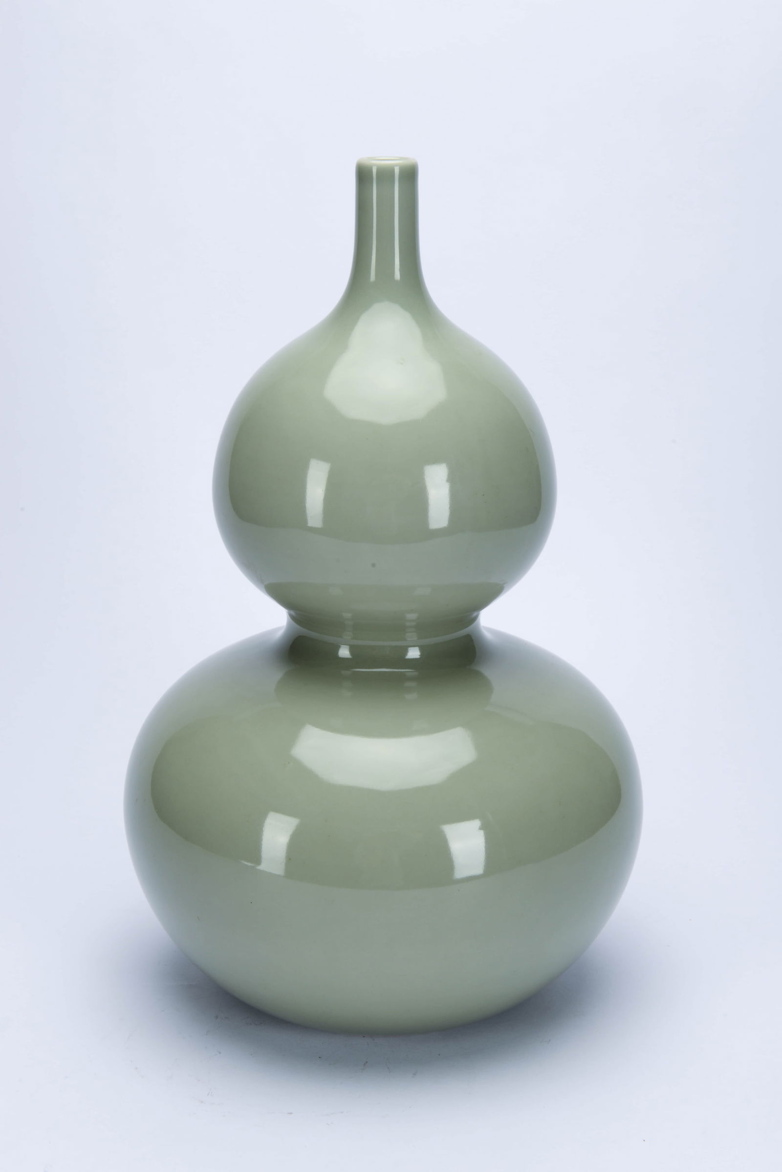 A PALE CELADON-GLAZED