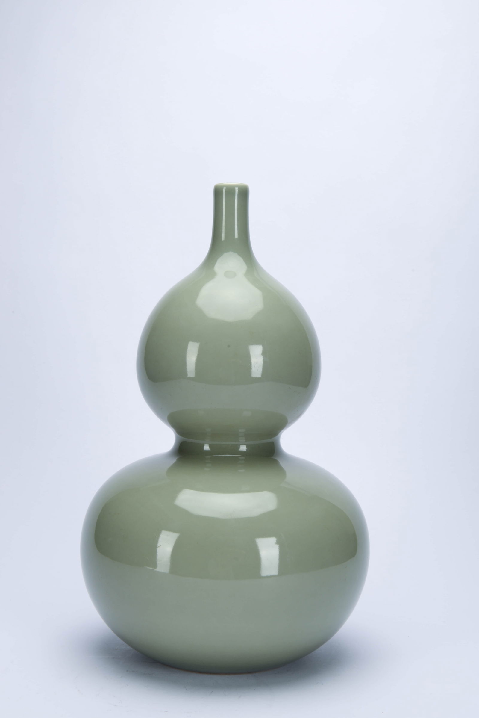 A PALE CELADON-GLAZED