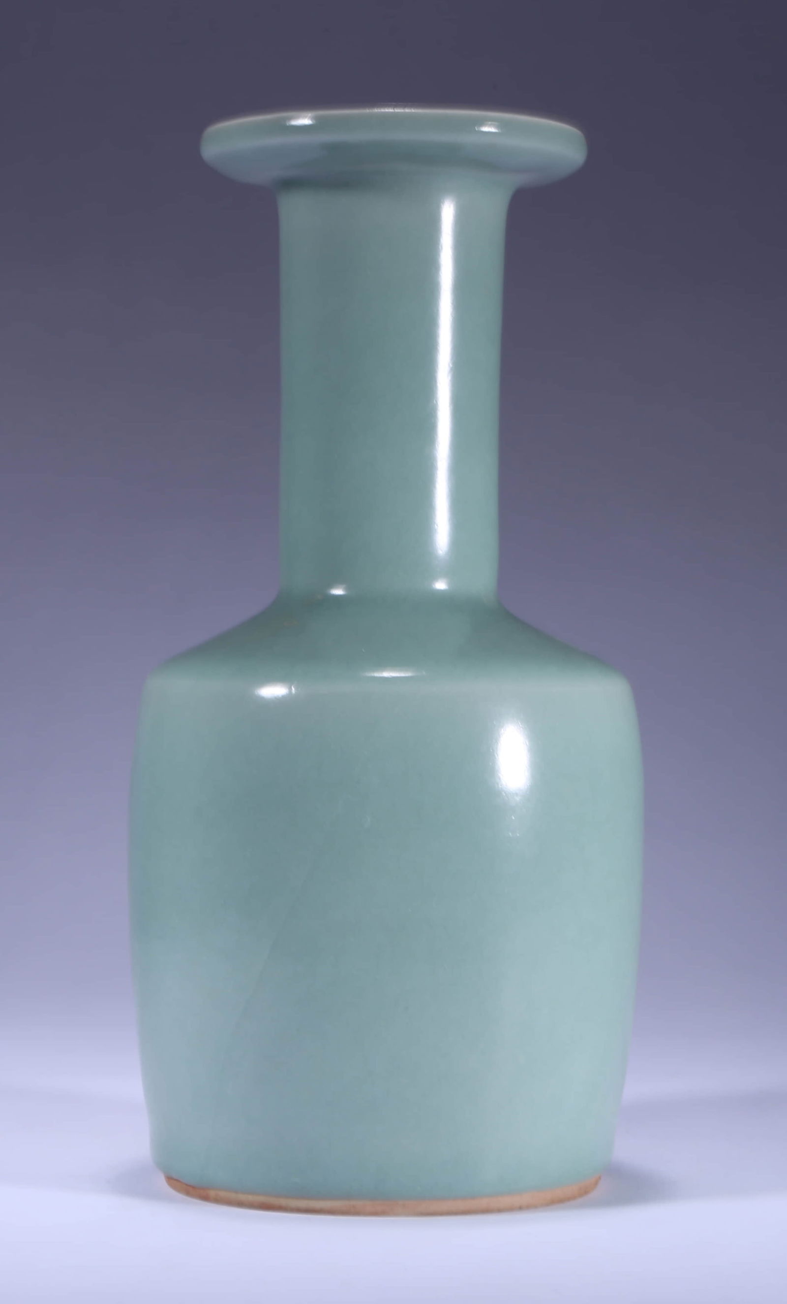 A PALE CELADON GLAZED MALLET