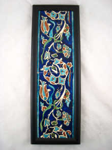 A panel of two Iznik tiles 12x40cm.