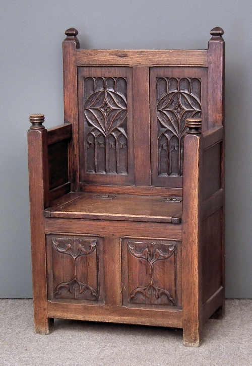 A panelled oak ''Monk's'' bench