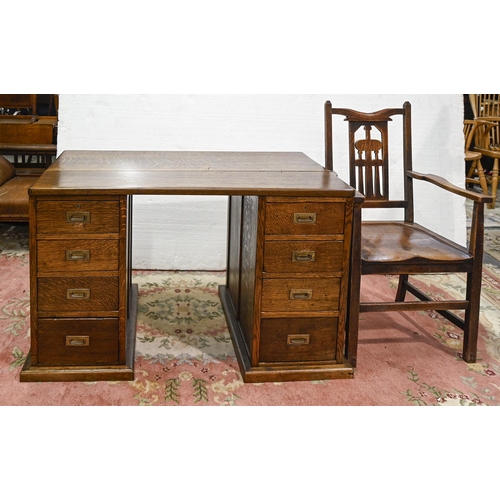 A panelled oak pedestal desk,