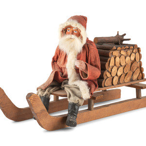 A Papier-Mâché Santa Claus on Log