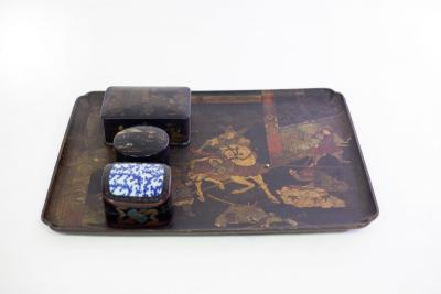 A papier-mâché tray decorated