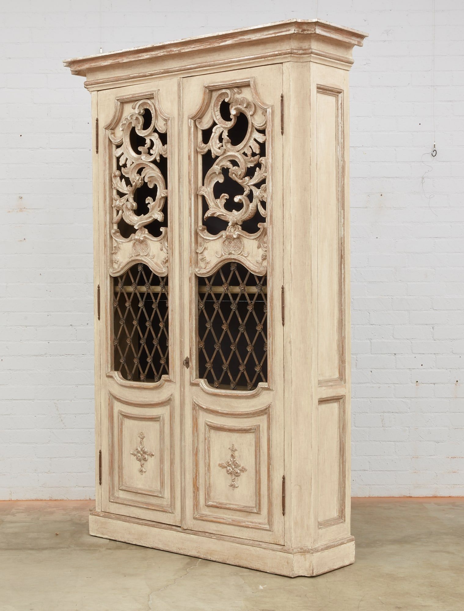 A PARCEL SILVER AND CREAM PAINTED