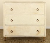 A PARCHMENT DRESSER BRONZE SAM