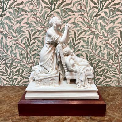 A Parian Ware mother and child,