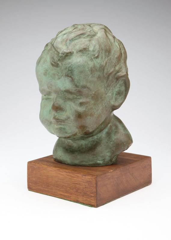 A patinated bronze bust depicting a