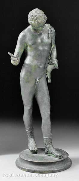 A Patinated Bronze Figure of
