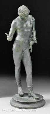 A Patinated Bronze Figure of "