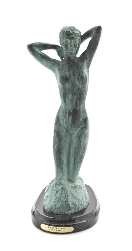A Patinated Bronze Figure of a Nude