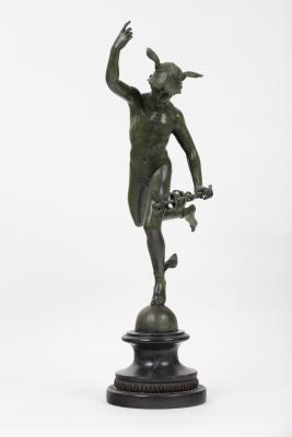 A patinated bronze figure of