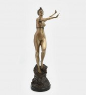 A PATINATED BRONZE MODEL OF DI