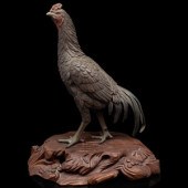 A Patinated-Bronze Okimono of