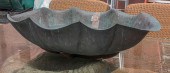 A PATINATED BRONZE SCALLOP FOR