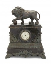 A PATINATED METAL AND MARBLE M