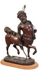 A PATINATED METAL MODEL OF A C