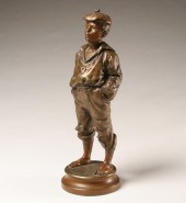 A patinated spelter figure of