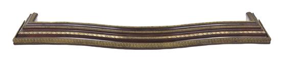 A Patinated Steel Fire Fender of