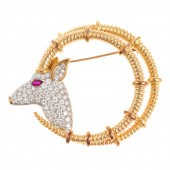A PAVE DIAMOND IBEX BROOCH IN