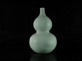 A PEA-GREEN GLAZED DOUBLE-GOUR