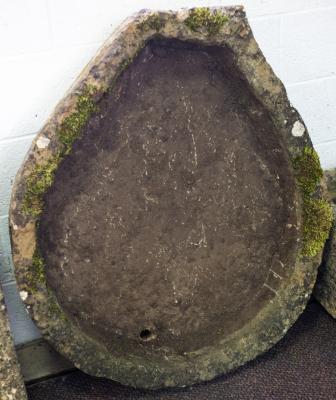 A pear-shaped stone trough, 104cm x