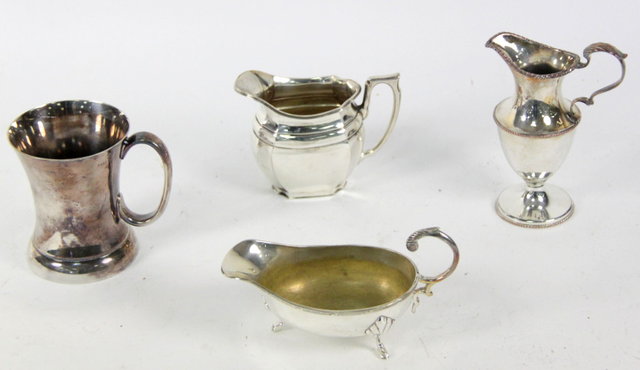 A pedestal cream jug another
