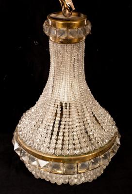 A pendant shade hung beaded glass