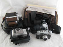 A Pentax MEF camera with auto and