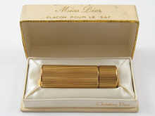 A perfume atomizer by Christian