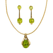 A PERIDOT AND 14K GOLD NECKLAC
