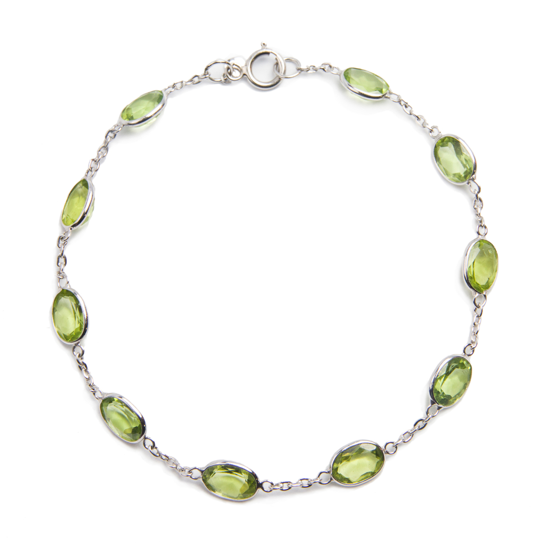 A PERIDOT AND EIGHTEEN KARAT