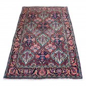 A PERSIAN BAKHTIARI CARPET A P