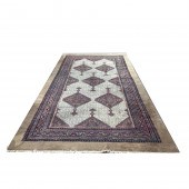 A PERSIAN CAMEL HAIR CARPET A