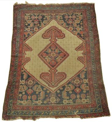 A Persian Carpet Approx. 4'-11" x
