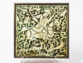 A PERSIAN FAIENCE TILE<br>A Pe