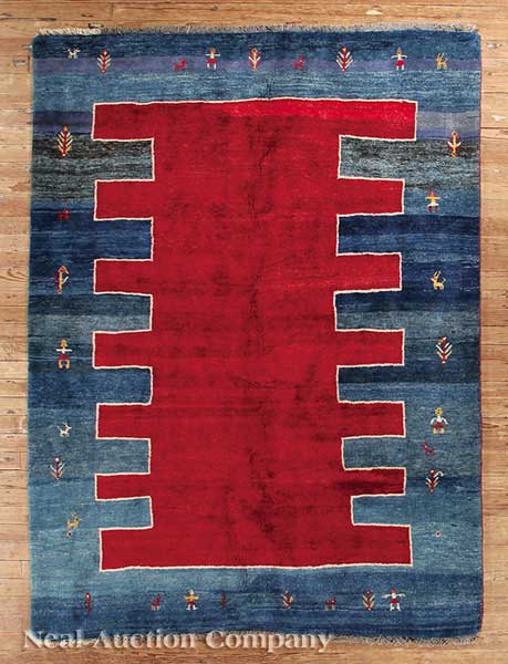 A Persian Gabeh Carpet crimson