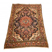 A PERSIAN HAMADAN CARPET A Per
