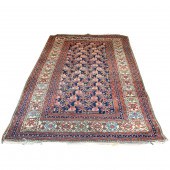 A PERSIAN HAMADAN CARPET A Per