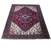 A PERSIAN HAMADAN CARPET A Per
